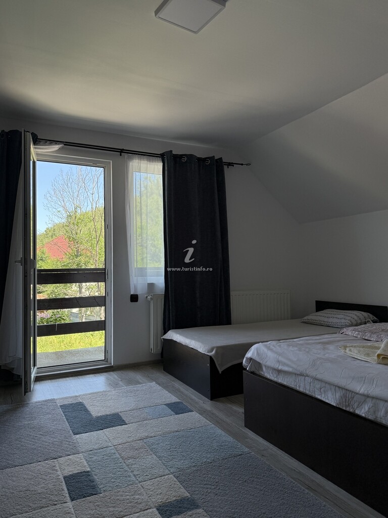 Camere de închiriat Căsuța cu Dumbravă