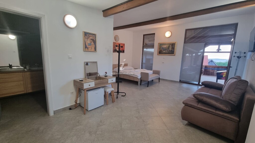 Casa de sub Brazi
