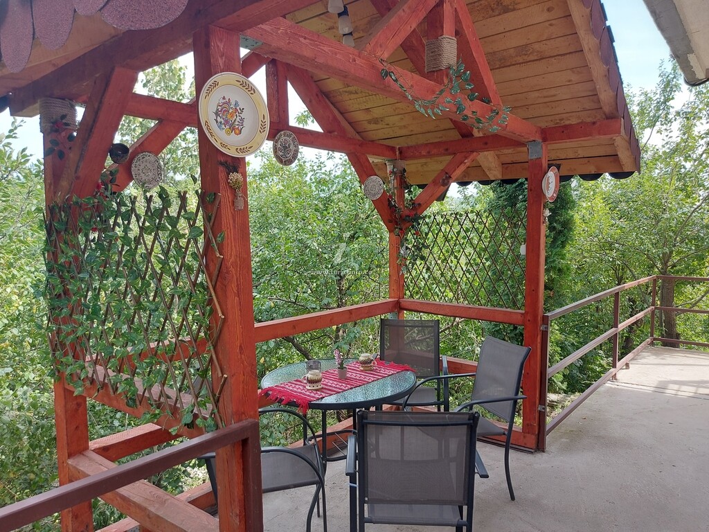 Casa de vacanță Căsuța cu Trandafiri 1