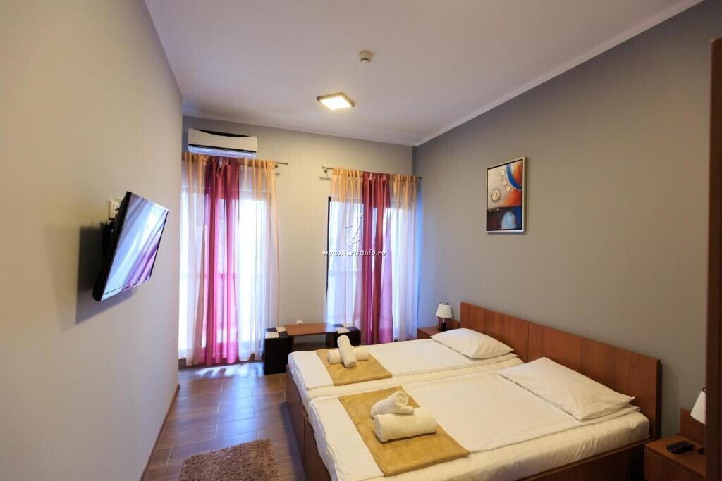 Camere de închiriat Corner Center