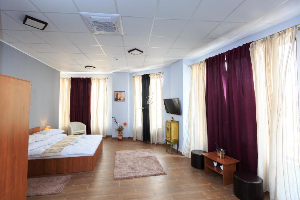 Camere de închiriat Corner Center