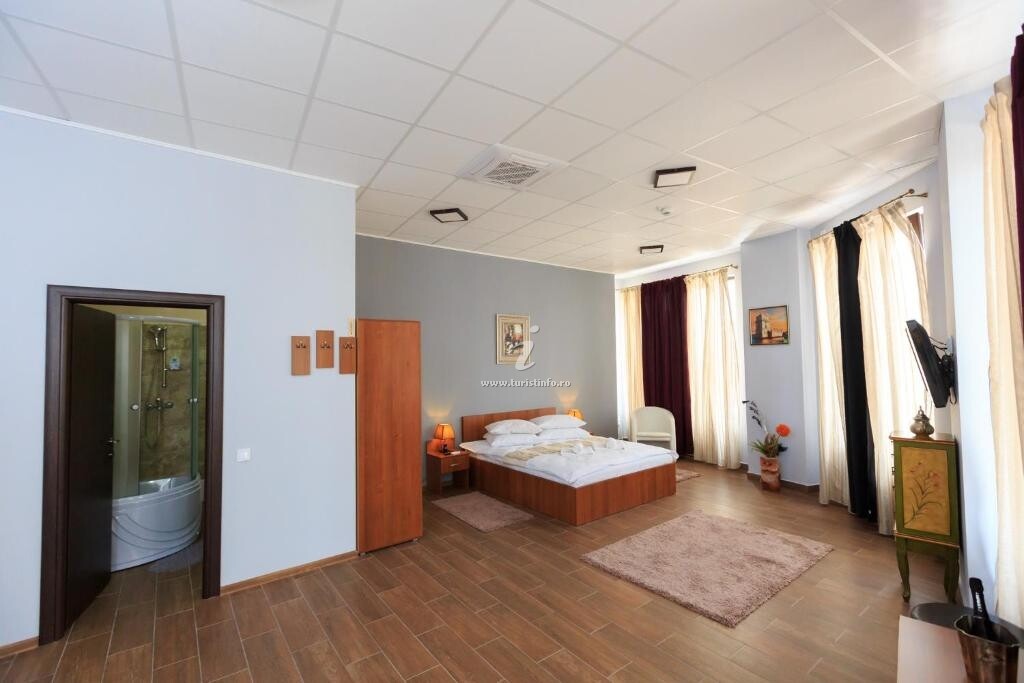 Camere de închiriat Corner Center
