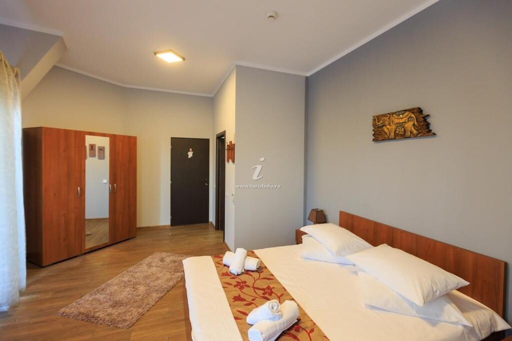 Camere de închiriat Corner Center