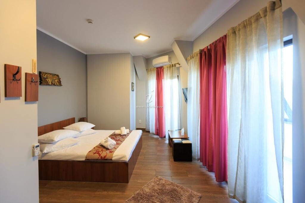 Camere de închiriat Corner Center