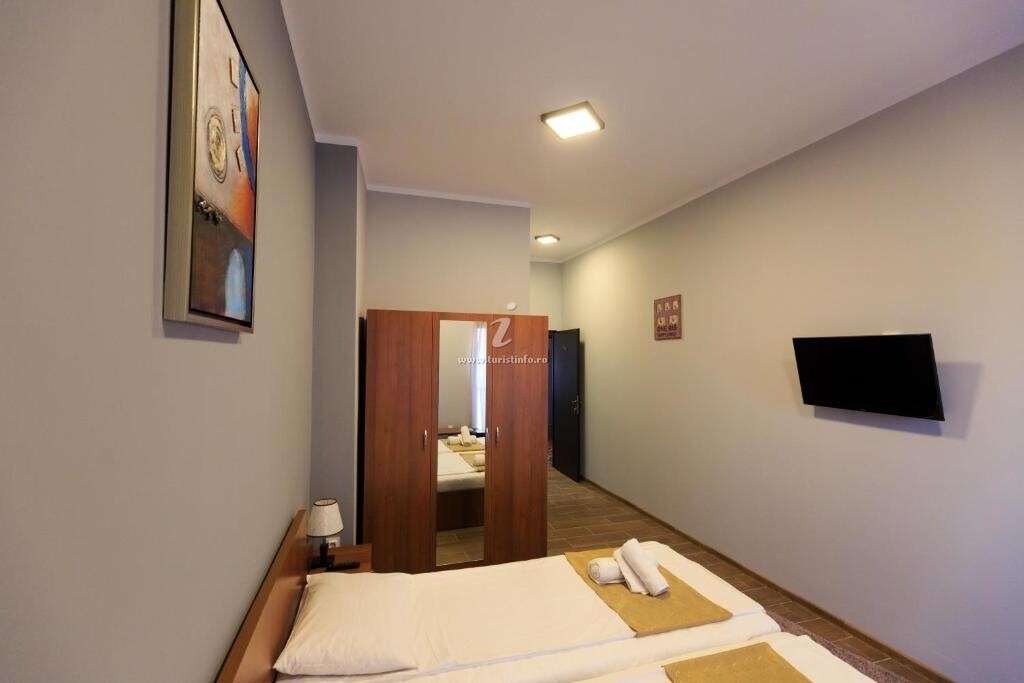 Camere de închiriat Corner Center