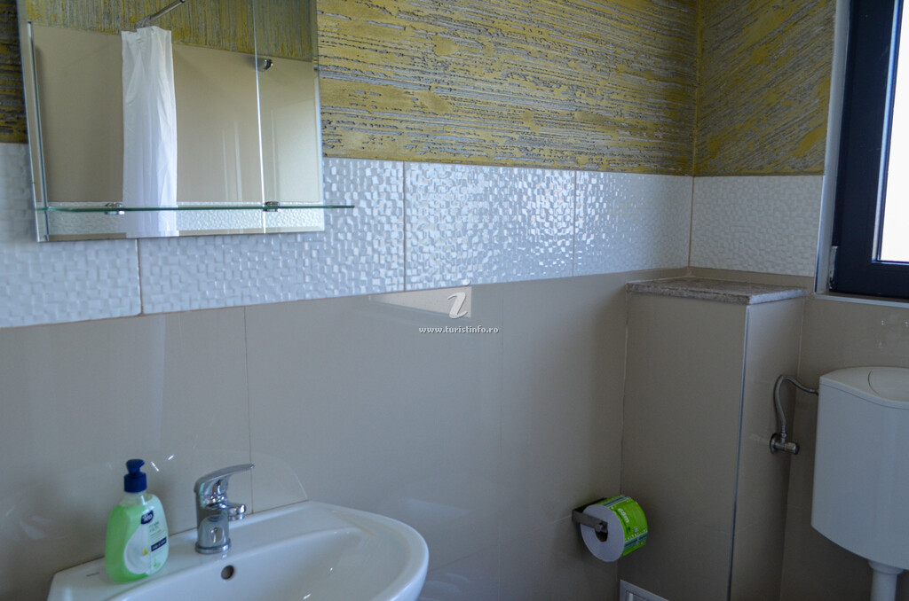Camere de închiriat Romsil Guesthouse