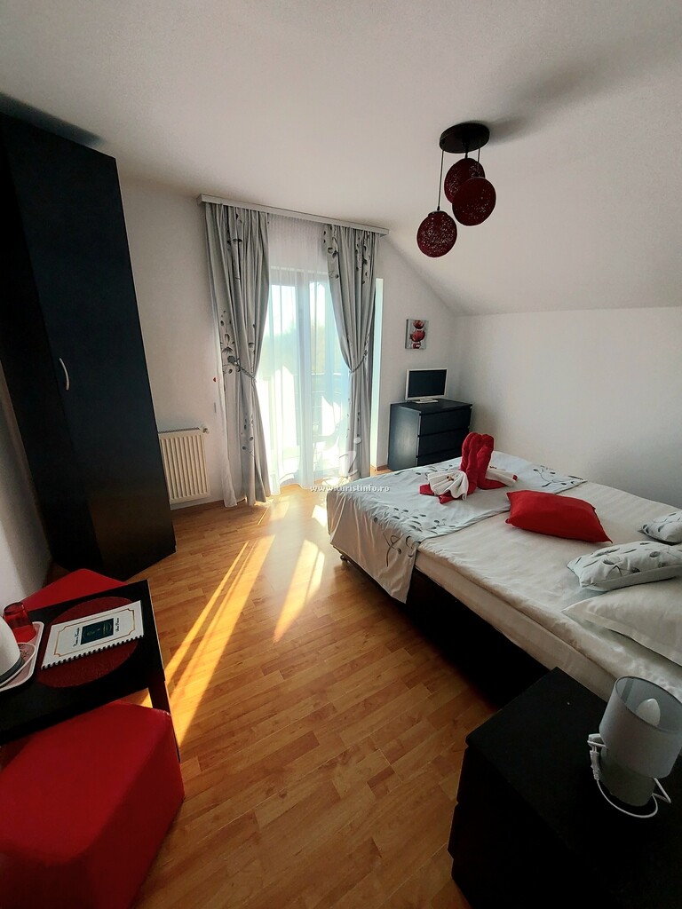 Casa de vacanță Căsuța cu Trandafiri 1