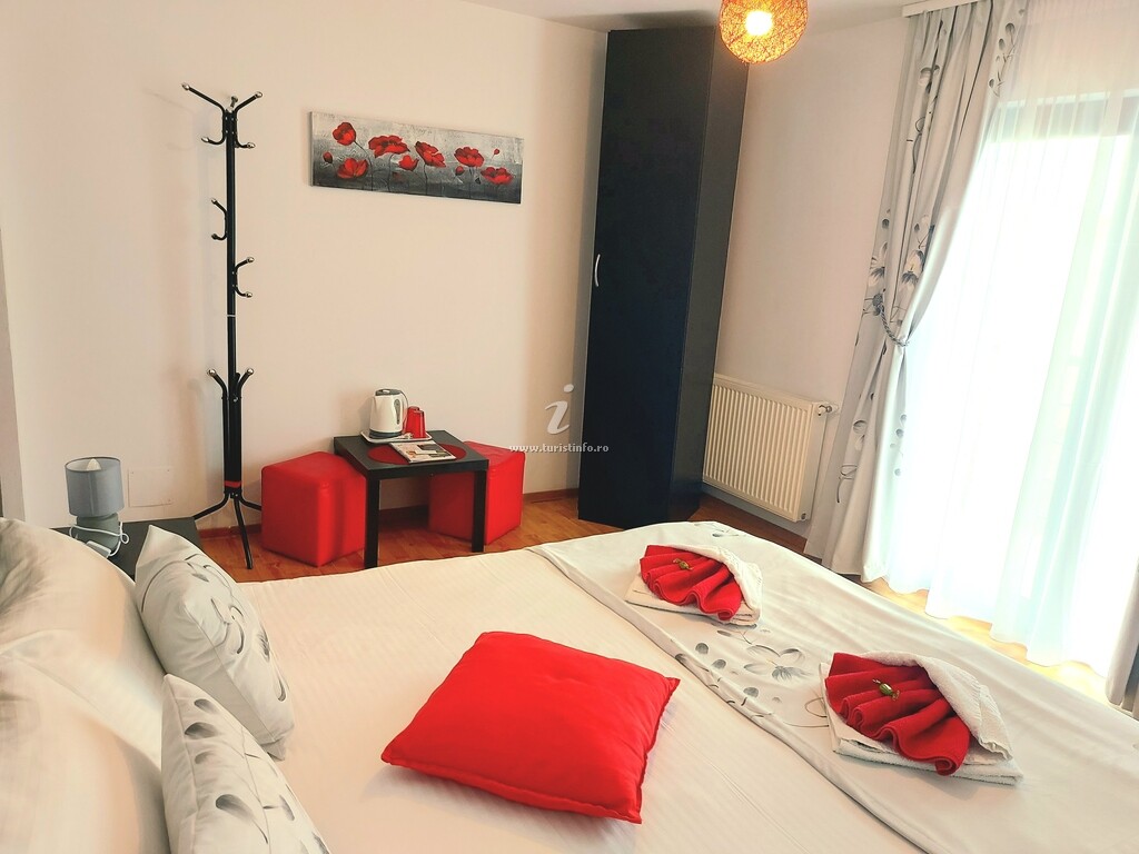 Casa de vacanță Căsuța cu Trandafiri 1
