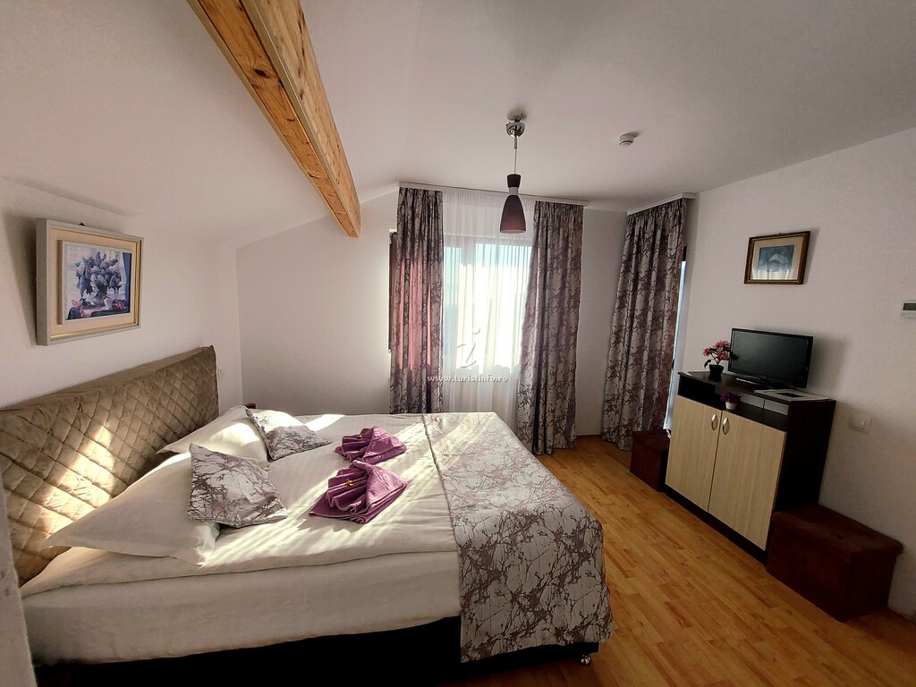 Casa de vacanță Căsuța cu Trandafiri 1