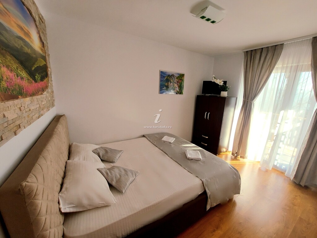 Casa de vacanță Căsuța cu Trandafiri 1